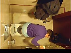 Short hair mature woman taking a pee