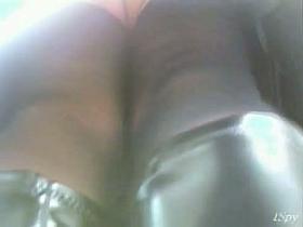 Peek of the ass of a Girl in stockings shopping with hubby