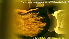 Hidden cam on the toilet ceiling