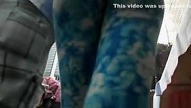 Girl in colorful blue tight pants