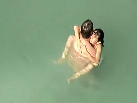 Nudist sex in the water