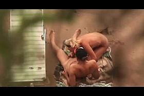 Voyeur on public beach. Blowjobs