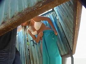 Girls in a beach cabin show us all part of