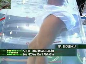 Sexy tv girl shows off an up skirt view of her g string