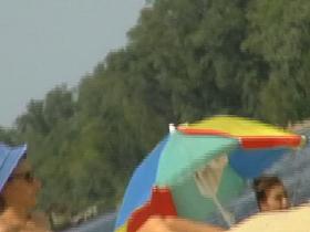 Amateur milfs on a hidden nudist beach cam