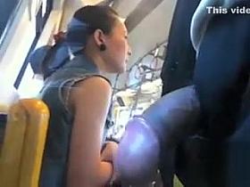 Dude wanks off on a stunning Asian lady while riding a bus