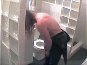 Spy cam in the bath room records nude babe dressing