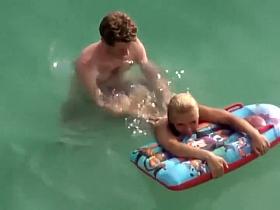 Guy trying to fuck her in the water