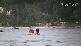 Hot blokes and sexy chicks tanning their bodied on the nudist beach