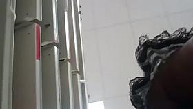 UPSKIRT--slim asian with a fat pussy peeking thru