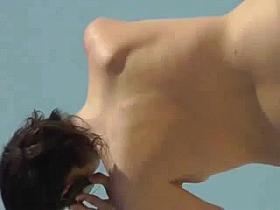 Spying on hot chick from beach