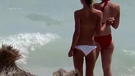 I can't wear a bra because of new tattoo! Beach Voyeur