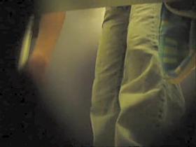 Babe in change room bends down and shows nice tits and ass