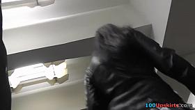 Raven-haired minx in sexy mini skirt gets upskirted