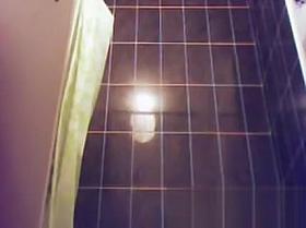 23 yo brunette with huge tits caught by spy cam in shower