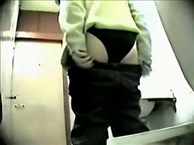 Female lost off pants and showed hairy slits on toilet cam