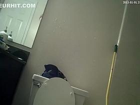 Girl caught in bathroom using the toilet