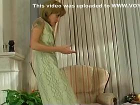 Blonde haired MILF takes a huge cock from behind