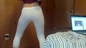 Girl in white leggings shaking booty
