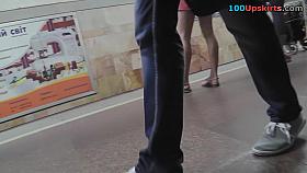 Amateur auburn girl shows g-string in candid upskirts