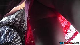 Upskirting gorgeous brunette in sexy yellows skirt