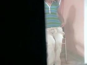 Charming chick from the solo spy cam video shows white panty