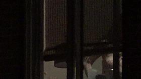Neighbor's tits through apartment window