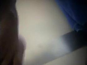 Lusty young coquette slides down her swimsuit to reveal her