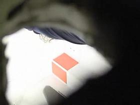 Tanned ass woman spied in public toilet peeing