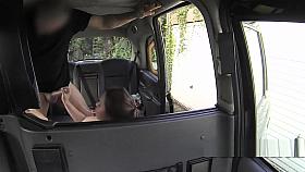 Lady in pink scarf deep throats in fake cab