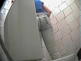 Tight pissing pussy gets spied