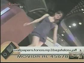 Blonde and brunette dancers in short dresses flash their sexy asses on live TV