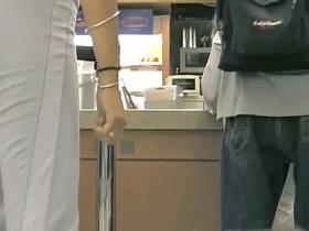 Hot booty in white pants in street candid video