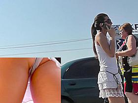 Dark-haired lady in classic panties in the upskirt clip