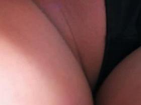 Upskirt voyeur shots of a sexy curvy teen in a striped dress