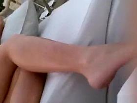 Upskirt video on blonde reading book