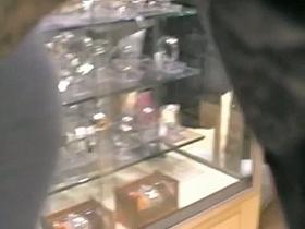 Busty babe in tight jeans caught on a candid cam