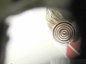 Short hair woman caught pissing in public toilet