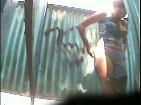 Amateur dressing room video showing a girl taking off her panties