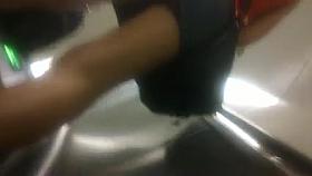 Girl in mini skirt upskirted on the escalator