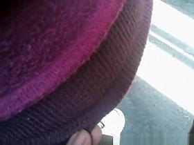 Man gently touches woman's butt