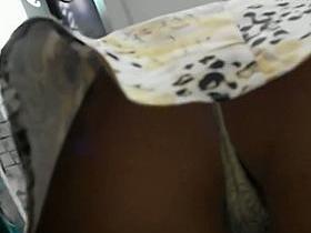 Mature babe shows us her thong in up skirt shopping mall