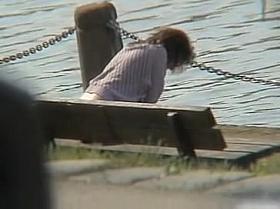 Amateur milf caught pissing on the river bank