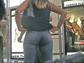 Non-nude voyeur video of a sexy girl filling up tight jeans