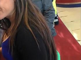 Busty brunette chick in tight blue top