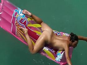 Pussy lips slip from hot milf's bikini