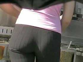 Tight pants girl in pink short gets a nice amateur voyeur cam shot