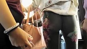 Nice ass woman in tight dark pants