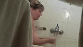 Mature housewife Mia spied in the bathroom
