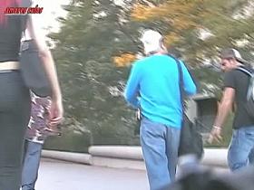 Street candid fit bitch with an incredibly nice ass walks in tight jeans